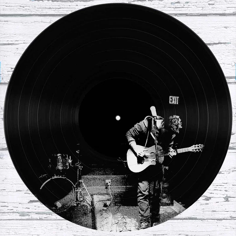#45 Lone Guitar Player on a Dark Stage