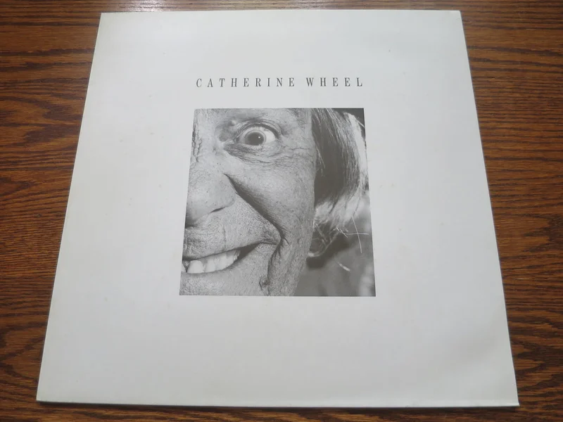 Catherine Wheel - Black Metallic 12"