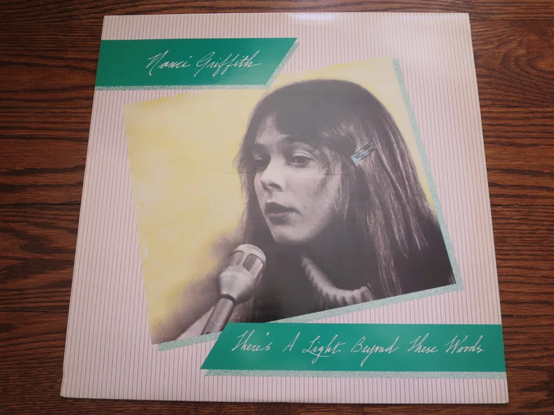 Nanci Griffith - There's A Light Beyond These Woods